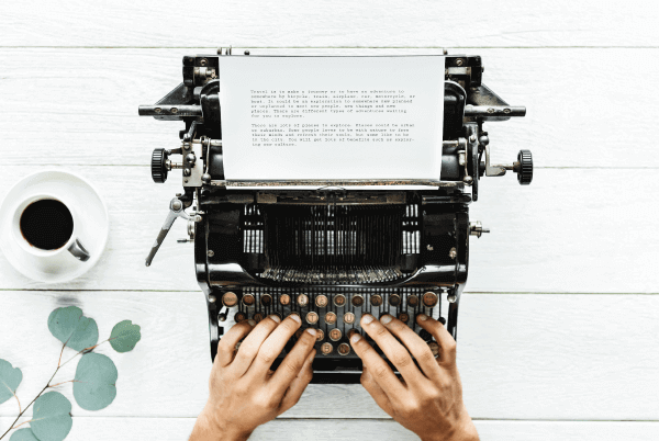 social media storytelling man writing on typewriter