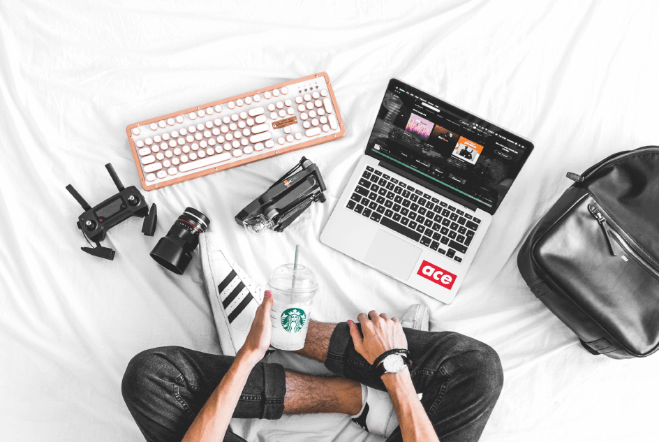 man watch starbucks macbook pro keyboard drone working at a laptop featured instagram marketing tools insta