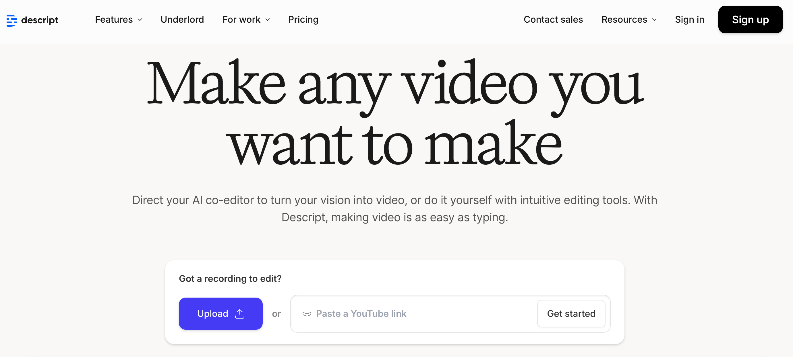 Descript homepage with tagline "Make any video you want to make" and options to upload or paste a YouTube link.