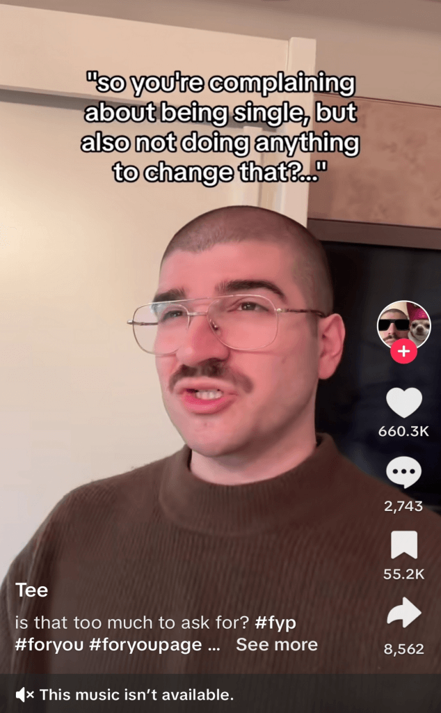 TikTok post of a man with glasses making a point about being single.