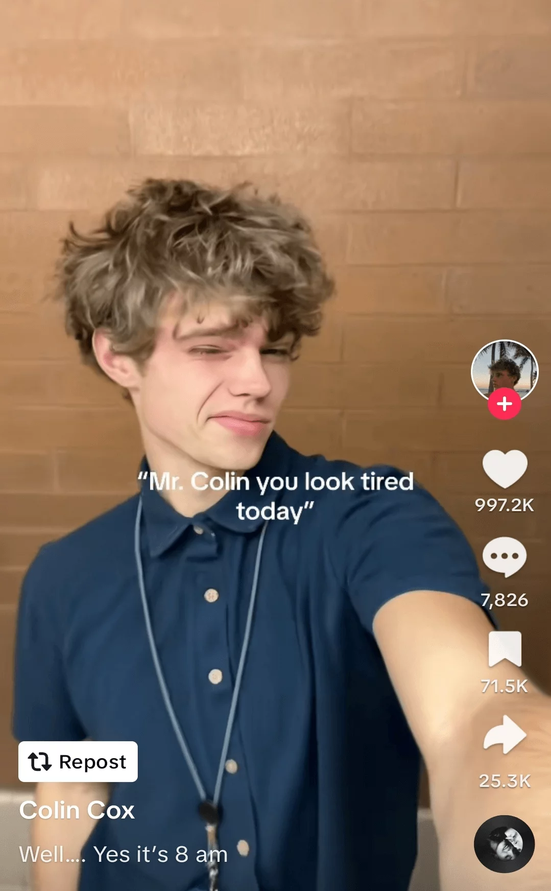 Young man with a tousled hairstyle making a wry expression, featured in a lighthearted social media post about looking tired early in the morning.