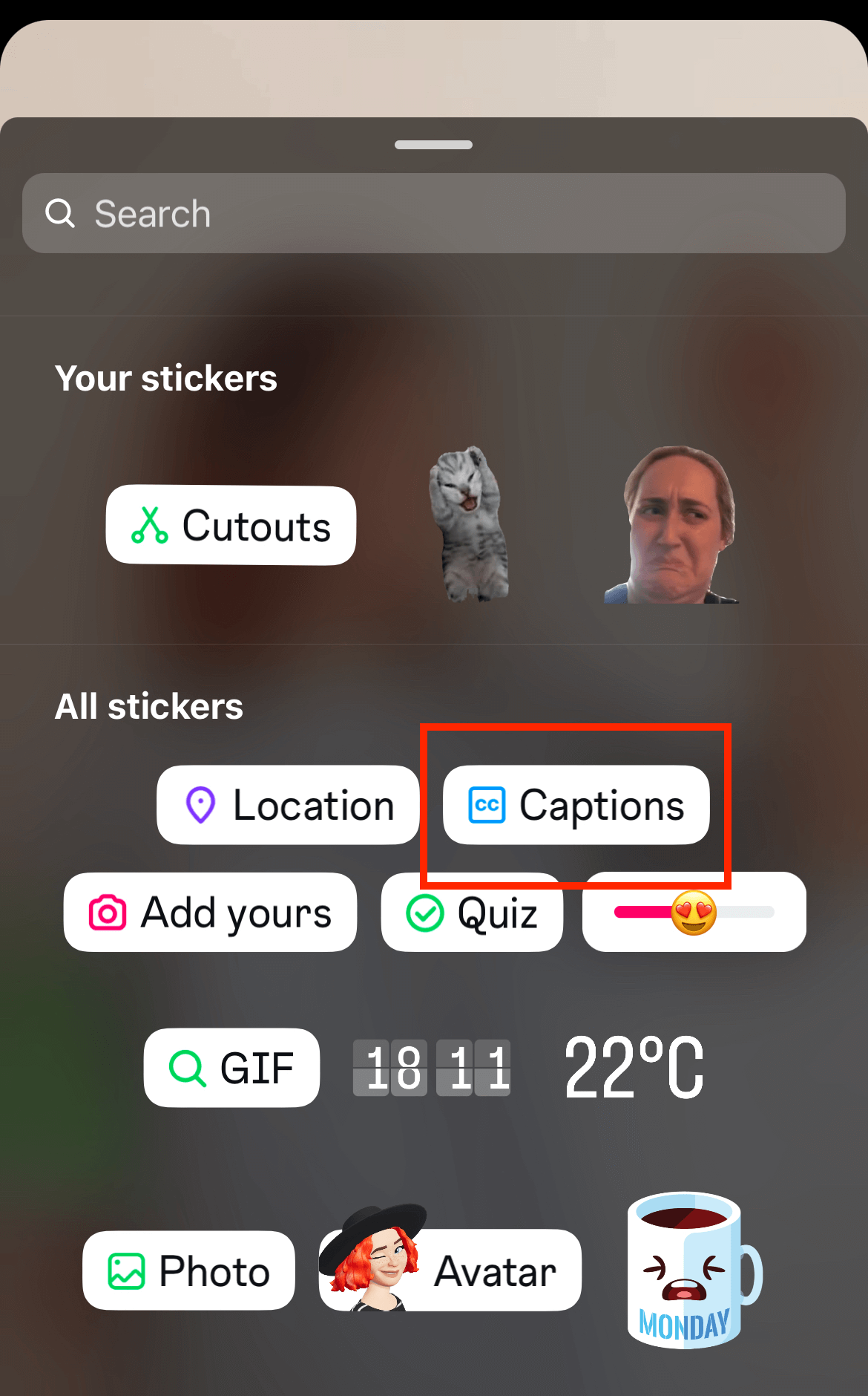 Sticker selection screen in a social media app with options like location, captions, GIFs, and more. Captions sticker is highlighted.