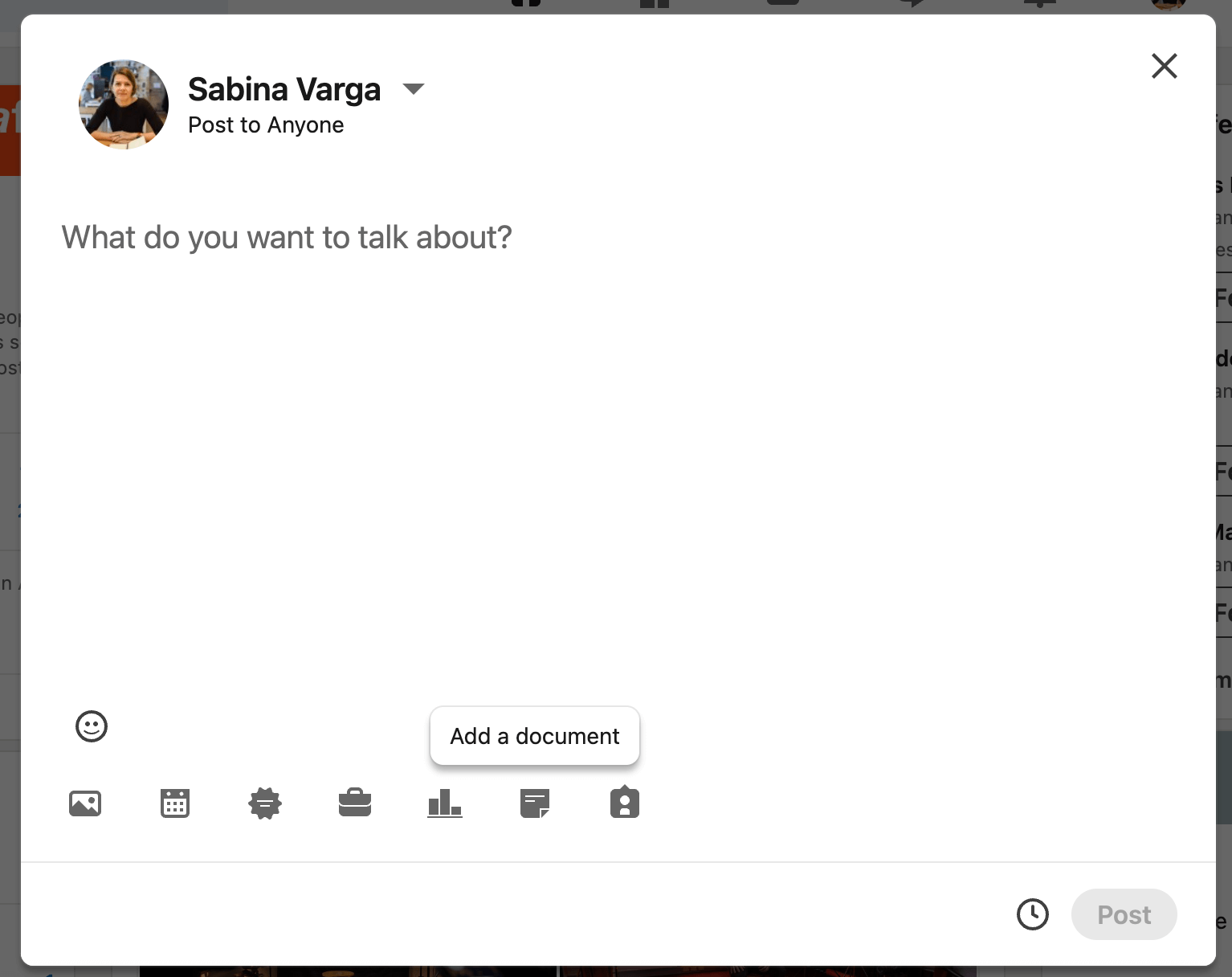 LinkedIn post creation window with the prompt "What do you want to talk about?" and an option to add a document along with other post tools.