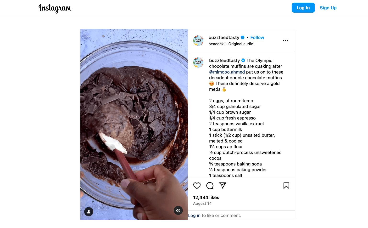 Close-up of chocolate muffin batter being mixed with chopped chocolate in a bowl, accompanied by a recipe for double chocolate muffins from BuzzFeed Tasty.