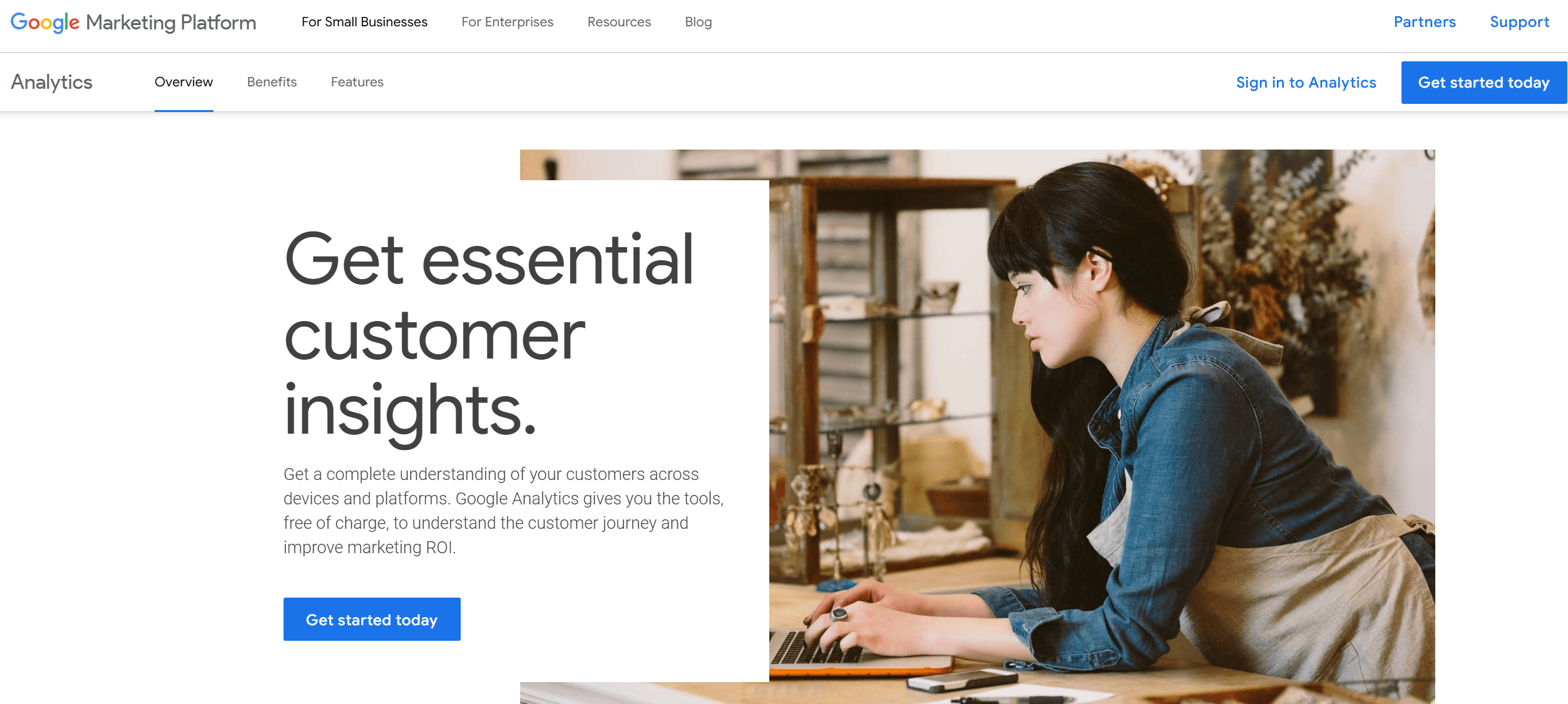 Google Analytics page with text promoting customer insights, alongside a woman working on a laptop in a rustic shop setting.