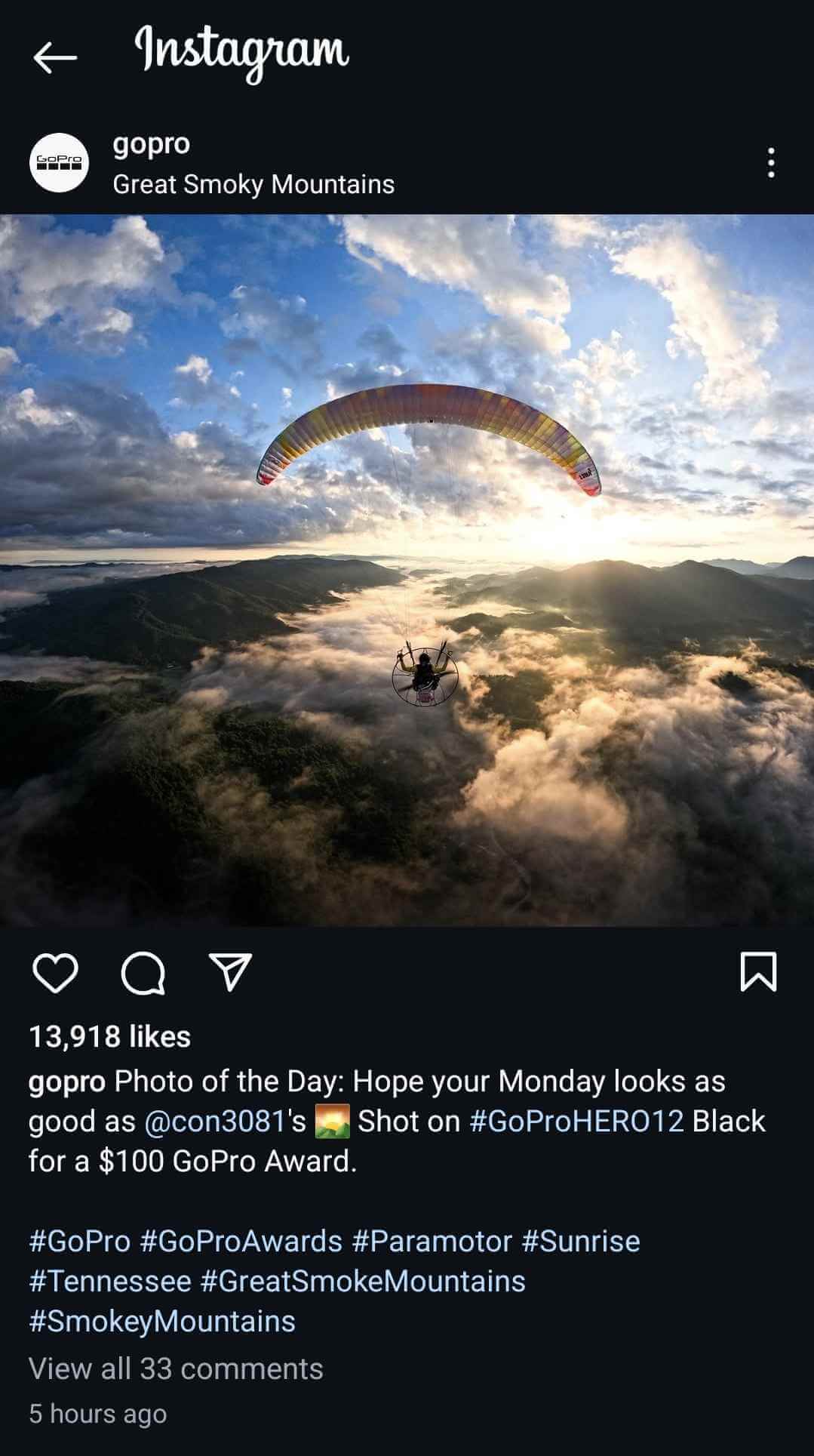 GoPro’s ‘Be a Hero’ campaign showing a paraglider soaring over the Great Smoky Mountains during sunrise, featured in GoPro's "Photo of the Day" Instagram post.