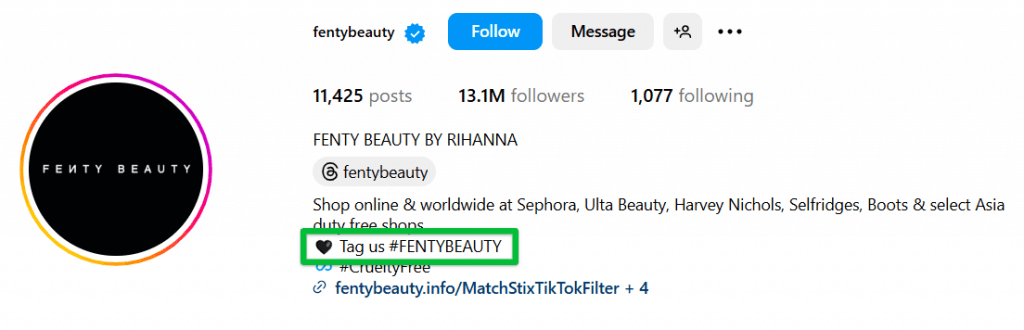 Fenty Beauty encourages user-generated content by adding #FENTYBEAUTY to its Instagram bio, boosting discoverability and followers. 