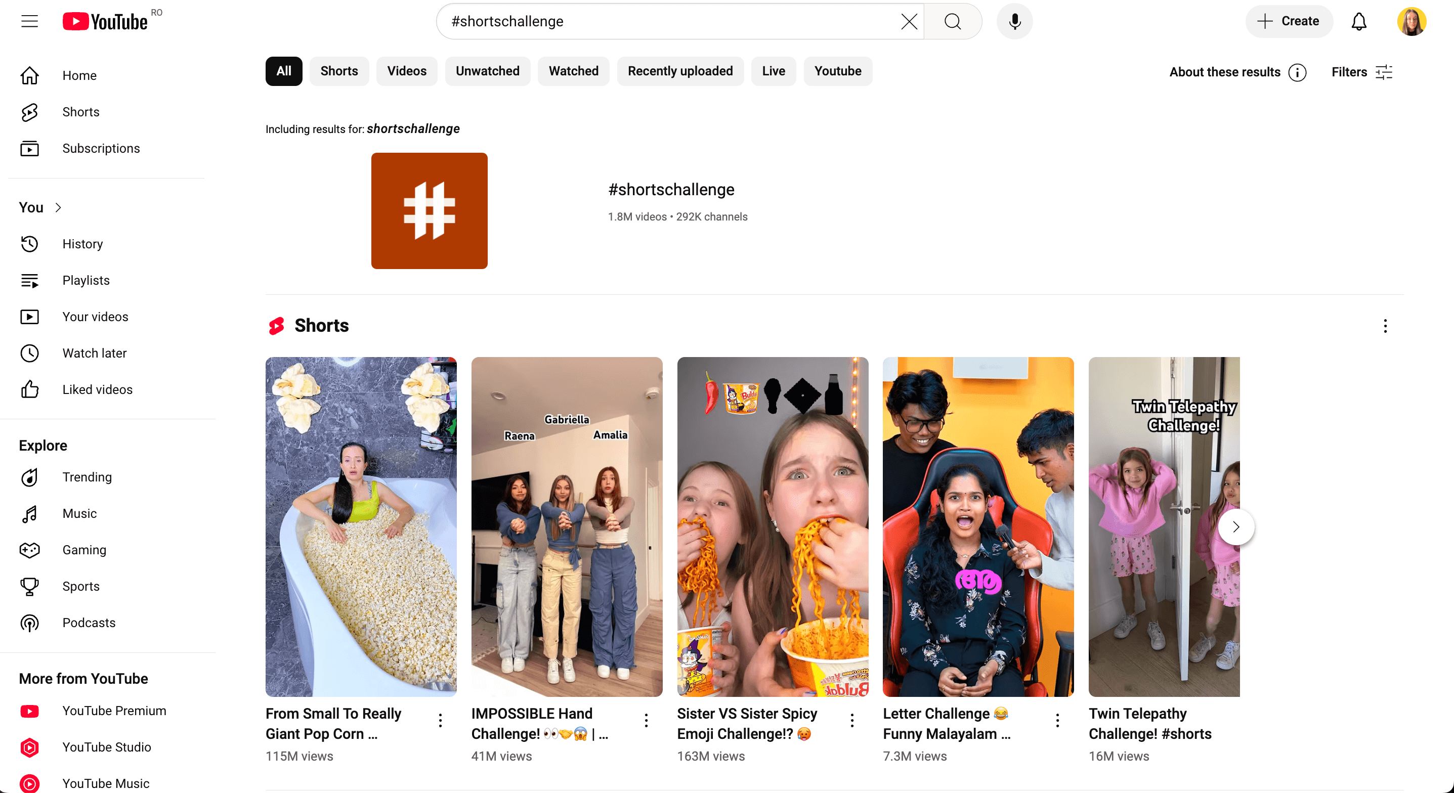YouTube Shorts page showcasing trending challenge videos like emoji and twin telepathy challenges.