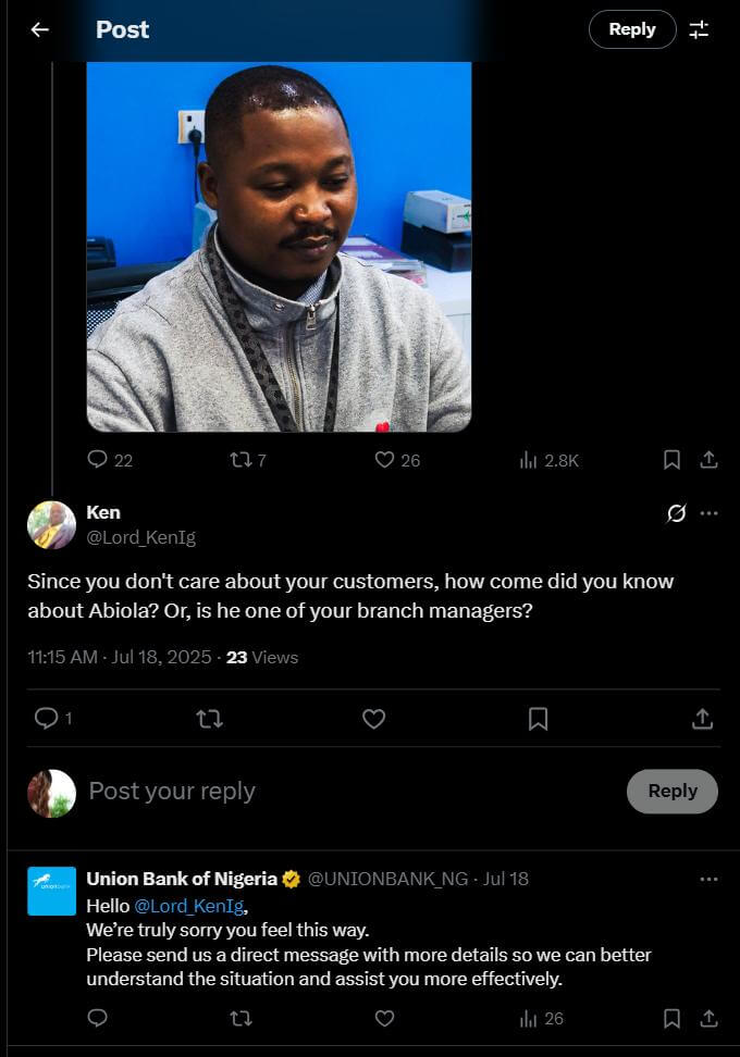 Man in grey sweater sits at desk; tweet accuses bank of favoritism, bank replies requesting DM for details.