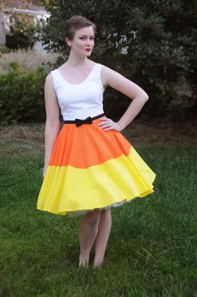 A woman dressed as Candy Corn for Halloween