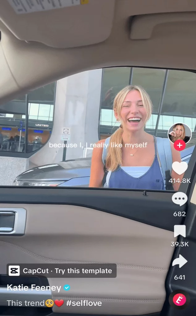 TikTok post of a smiling woman approaching a car door from the outside, the photo is taken from inside the car