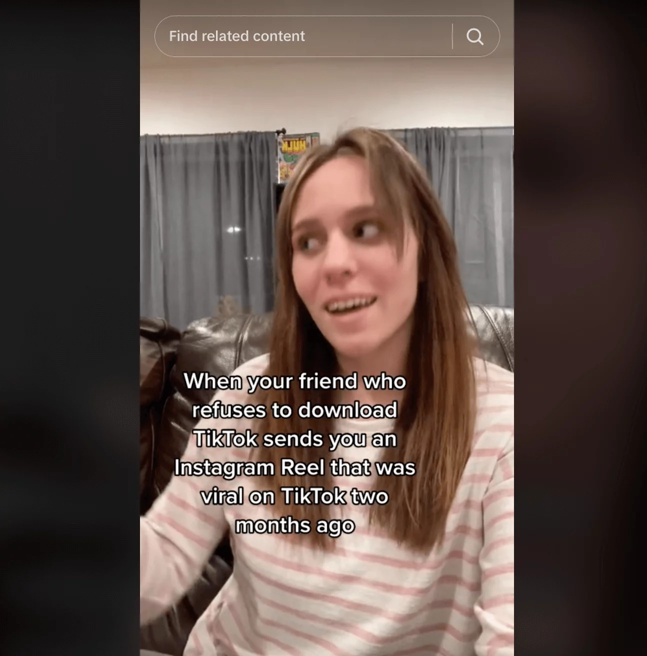 Woman sitting on a couch with a caption about friends sending viral Instagram Reels from TikTok two months late.