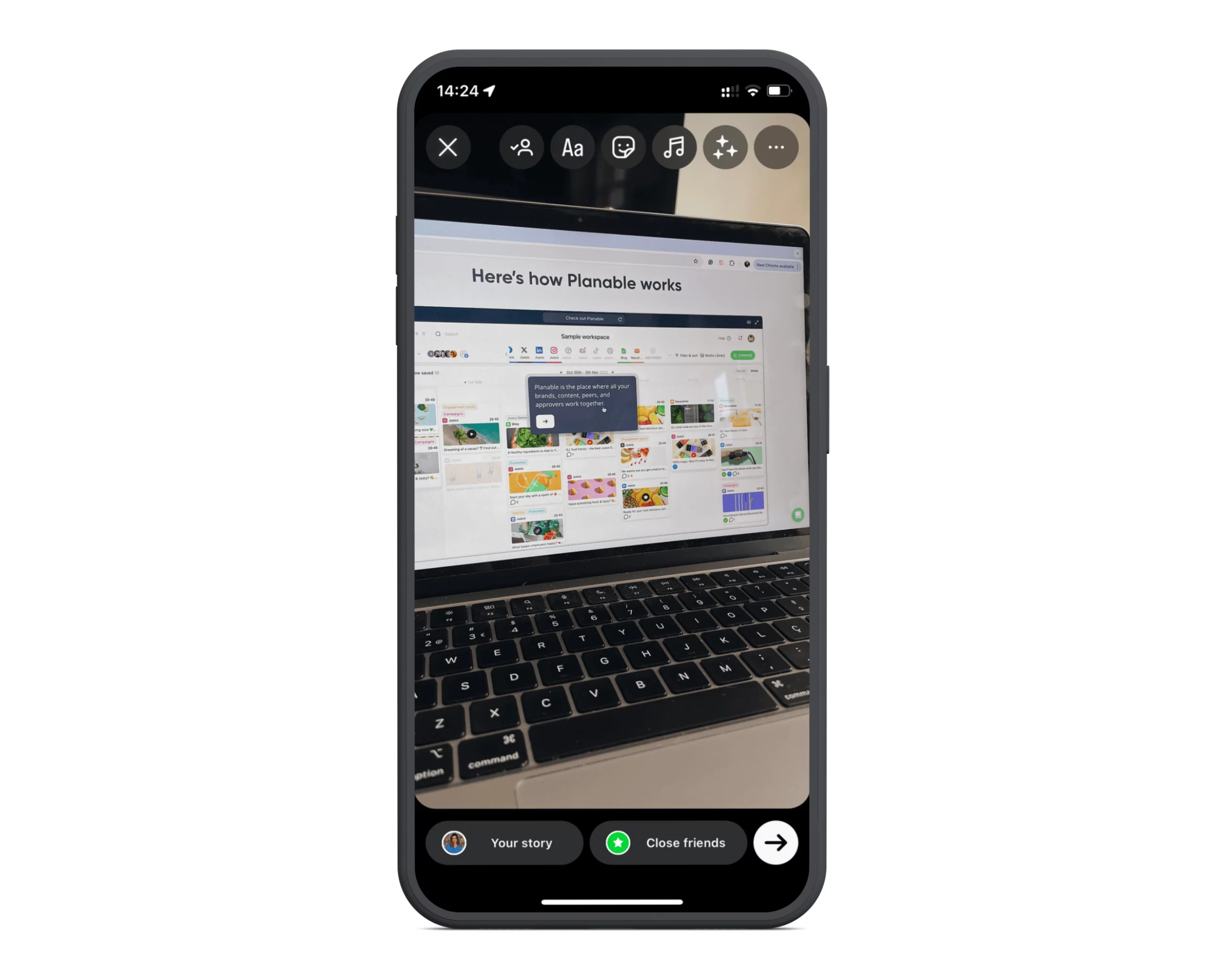 Phone screen showing an Instagram story draft with a photo of Planable’s workspace interface on a laptop screen.