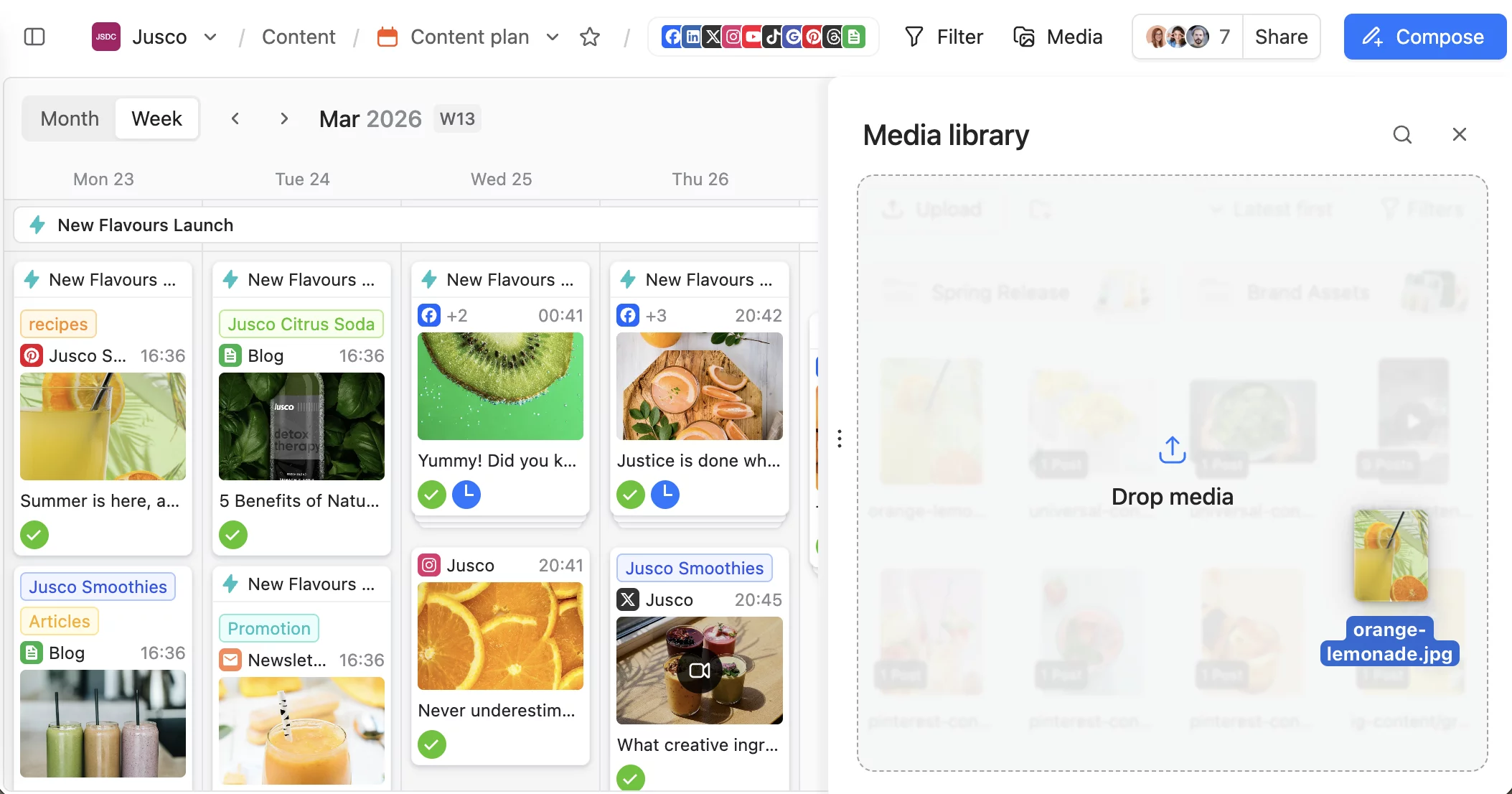 Planable content calendar with media library panel showing drag and drop upload of orange lemonade image